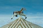 The horse on top of the carousel on the summer sea-
front, Berck-sur-Mer, Pas de Calais (department 62), 
France